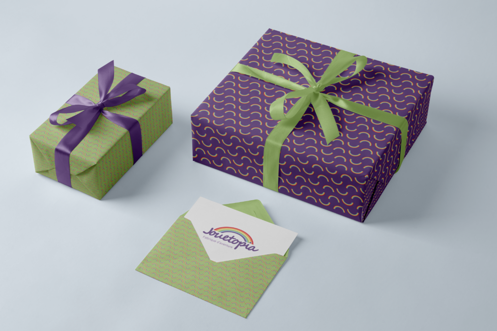 Mockup papier cadeau Jouetopia univers graphique coloré ludique